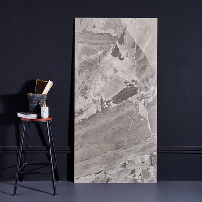 Dark colored ceramic tiles, marble tiles throughout the living room
